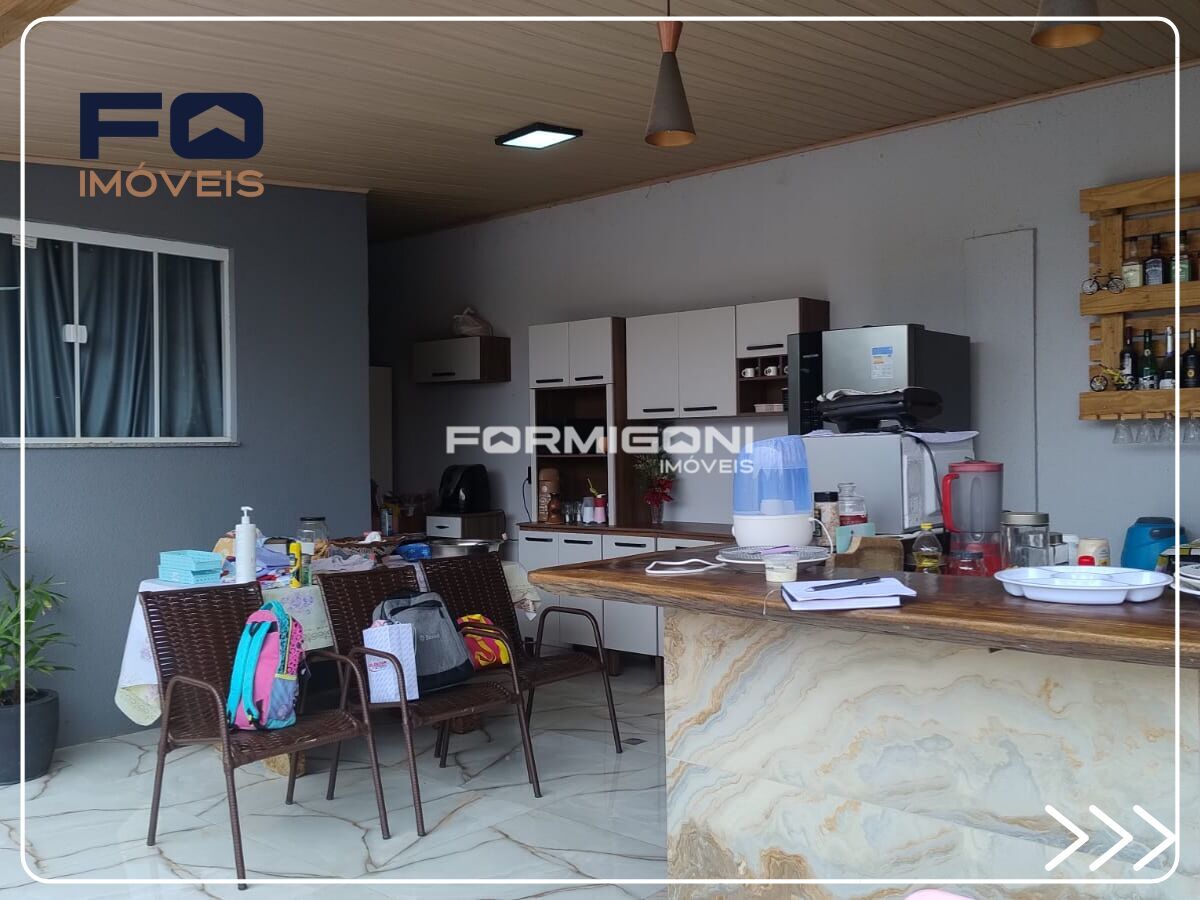 Casa com Barracão