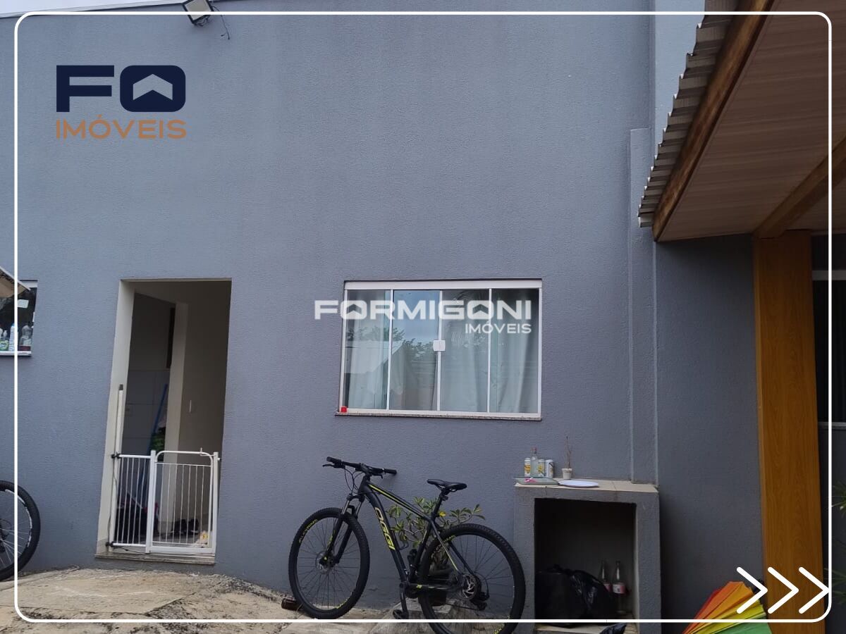 Casa com Barracão
